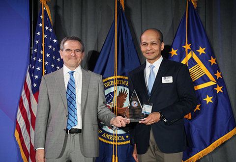Dr. Sundip Roy and Dr. Steven Lieberman pose with the Most Improved Outpatient Experience Award